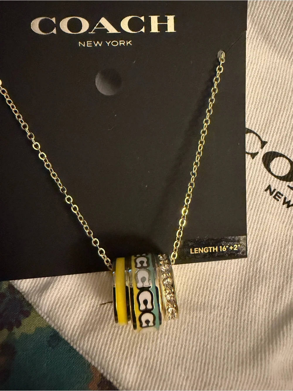 COACH Gold-Tone Yellow and Green Enamel Ring Pendant Necklace